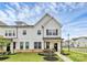Beautiful two-story townhome with manicured lawn, and inviting front porch at 720 Herlong S Ave, Rock Hill, SC 29732