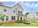 Beautiful two-story townhome with manicured lawn, and inviting front porch at 720 Herlong S Ave, Rock Hill, SC 29732