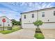 Modern townhome featuring a white exterior, attached garage, and well-maintained landscaping at 720 Herlong S Ave, Rock Hill, SC 29732