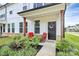 Inviting front porch with seating, manicured landscaping, and a charming entrance at 720 Herlong S Ave, Rock Hill, SC 29732
