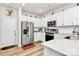 Modern white kitchen with stainless steel appliances and stylish countertop details at 720 Herlong S Ave, Rock Hill, SC 29732