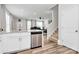 Modern kitchen with a breakfast bar, stainless dishwasher, and hardwood flooring at 720 Herlong S Ave, Rock Hill, SC 29732