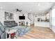An open-concept living room features hardwood floors and lots of natural light at 720 Herlong S Ave, Rock Hill, SC 29732