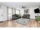An open living room features hardwood floors, seating, and natural light at 720 Herlong S Ave, Rock Hill, SC 29732