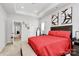 A bright main bedroom with modern decor, tray ceilings, and ensuite bath at 720 Herlong S Ave, Rock Hill, SC 29732