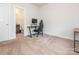 Bedroom featuring carpeted floors, a gaming desk, and white walls at 805 Old Little Rock Rd, Charlotte, NC 28214
