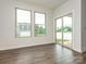 Bright bonus room features lots of natural light and hardwood floors at 805 Old Little Rock Rd, Charlotte, NC 28214