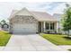 Charming single-Gathering home with stone accents, a two-car garage, and a manicured front lawn at 805 Old Little Rock Rd, Charlotte, NC 28214