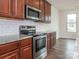 Updated kitchen featuring granite countertops and stainless steel appliances at 805 Old Little Rock Rd, Charlotte, NC 28214