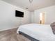 A cozy main bedroom features neutral walls and soft carpeting at 805 Old Little Rock Rd, Charlotte, NC 28214