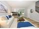 Inviting living room showcasing fireplace, an open floorplan and staircase access at 8611 Earthenware Dr, Charlotte, NC 28269