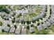 Aerial view of a property in Charlotte, NC, with a fenced yard and mature trees in a suburban setting at 10211 Snowbell Ct, Charlotte, NC 28215