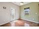 Cozy dining area with hardwood floors and access to the backyard at 10211 Snowbell Ct, Charlotte, NC 28215