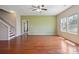 Bright living room with hardwood floors and large windows at 10211 Snowbell Ct, Charlotte, NC 28215