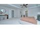 Bright bedroom features tray ceiling, modern furnishings, and neutral decor at 1025 Harrogate Dr, Bessemer City, NC 28016