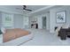 Spacious bedroom with tray ceiling, sitting area, and plenty of natural light at 1025 Harrogate Dr, Bessemer City, NC 28016