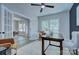 Bright home office with French doors, modern decor, and a comfortable workspace, perfect for productivity and inspiration at 1025 Harrogate Dr, Bessemer City, NC 28016