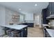 Spacious eat-in kitchen with an island and counter seating at 1025 Harrogate Dr, Bessemer City, NC 28016