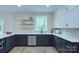 Modern kitchen featuring white countertops and dark cabinets at 1025 Harrogate Dr, Bessemer City, NC 28016
