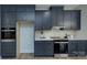 Contemporary kitchen featuring stainless steel appliances and dark cabinets at 1025 Harrogate Dr, Bessemer City, NC 28016