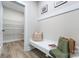 Stylish mudroom with built-in bench and access to a walk-in closet at 1025 Harrogate Dr, Bessemer City, NC 28016