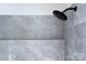 Shower detail showcasing the tile design and modern shower head at 1025 Harrogate Dr, Bessemer City, NC 28016