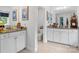 Bathroom with double vanity sinks, granite countertops, and updated fixtures at 107 Hornbeam Ln, Mooresville, NC 28117