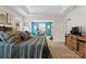 Primary bedroom boasts natural lighting and opens to an adjacent workspace at 107 Hornbeam Ln, Mooresville, NC 28117