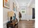 Inviting entryway with wood flooring, decor, and natural light from the front door at 107 Hornbeam Ln, Mooresville, NC 28117