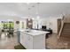 Open-concept kitchen with large island, stainless appliances, and seamless flow to the living area at 107 Hornbeam Ln, Mooresville, NC 28117
