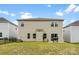 Backyard with a well-maintained lawn and patio at 11518 Solstice Way, Huntersville, NC 28078
