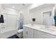 Clean bathroom featuring double vanity, tub-shower combination, and modern finishes at 11518 Solstice Way, Huntersville, NC 28078