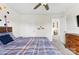 Bedroom featuring a wooden dresser and doorway leading to another room at 11518 Solstice Way, Huntersville, NC 28078