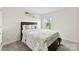 Comfortable bedroom with a scenic view and a cozy feeling at 11518 Solstice Way, Huntersville, NC 28078