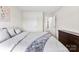 Serene bedroom with soft bedding and access to closet and hallway at 11518 Solstice Way, Huntersville, NC 28078