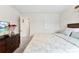 Bedroom with plush bed, soft lighting, and access to closet and hallway at 11518 Solstice Way, Huntersville, NC 28078