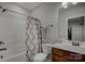 Cozy bathroom features a shower-tub combo, vanity, and stylish fixtures at 11718 Preservation Ln, Charlotte, NC 28278