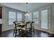 Bright breakfast nook with large windows and access to outdoor area at 11718 Preservation Ln, Charlotte, NC 28278