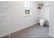 Walk-in closet features carpet and wire shelving at 12012 Zazu Way, Charlotte, NC 28215