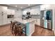 Modern kitchen featuring stainless steel appliances, ample countertop space and a center island at 13421 Copley Square Dr, Huntersville, NC 28078
