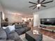 Open-concept living space with hardwood floors and views of the dining area and kitchen at 13421 Copley Square Dr, Huntersville, NC 28078