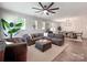 Bright living room featuring recessed lighting, hardwood flooring, and open floor plan at 13421 Copley Square Dr, Huntersville, NC 28078