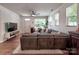 Bright living room featuring recessed lighting, hardwood flooring, and open floor plan at 13421 Copley Square Dr, Huntersville, NC 28078