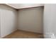 Empty closet with a wooden shelf and rod for hanging clothes at 1457 Matthew Allen Cir, Kannapolis, NC 28081