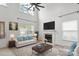 Bright, airy living room with high ceilings, fireplace, large windows, and modern decor at 1457 Matthew Allen Cir, Kannapolis, NC 28081