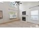 Spacious living room with fireplace and large window with plenty of natural light at 1457 Matthew Allen Cir, Kannapolis, NC 28081