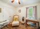 Bedroom featuring hardwood floors, a ceiling fan, and a sewing machine on a table at 1505 Moss Springs Rd, Albemarle, NC 28001