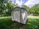 Convenient metal shed offers practical storage and organization in a nicely shaded area at 1505 Moss Springs Rd, Albemarle, NC 28001