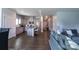 Open concept kitchen with granite countertops, stainless steel appliances, flowing into the living area at 177 Willow Valley Dr, Mooresville, NC 28115