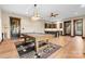 Basement entertainment area features a pool table, wet bar with seating, and access to other rooms at 1822 Irby Rd, Monroe, NC 28112